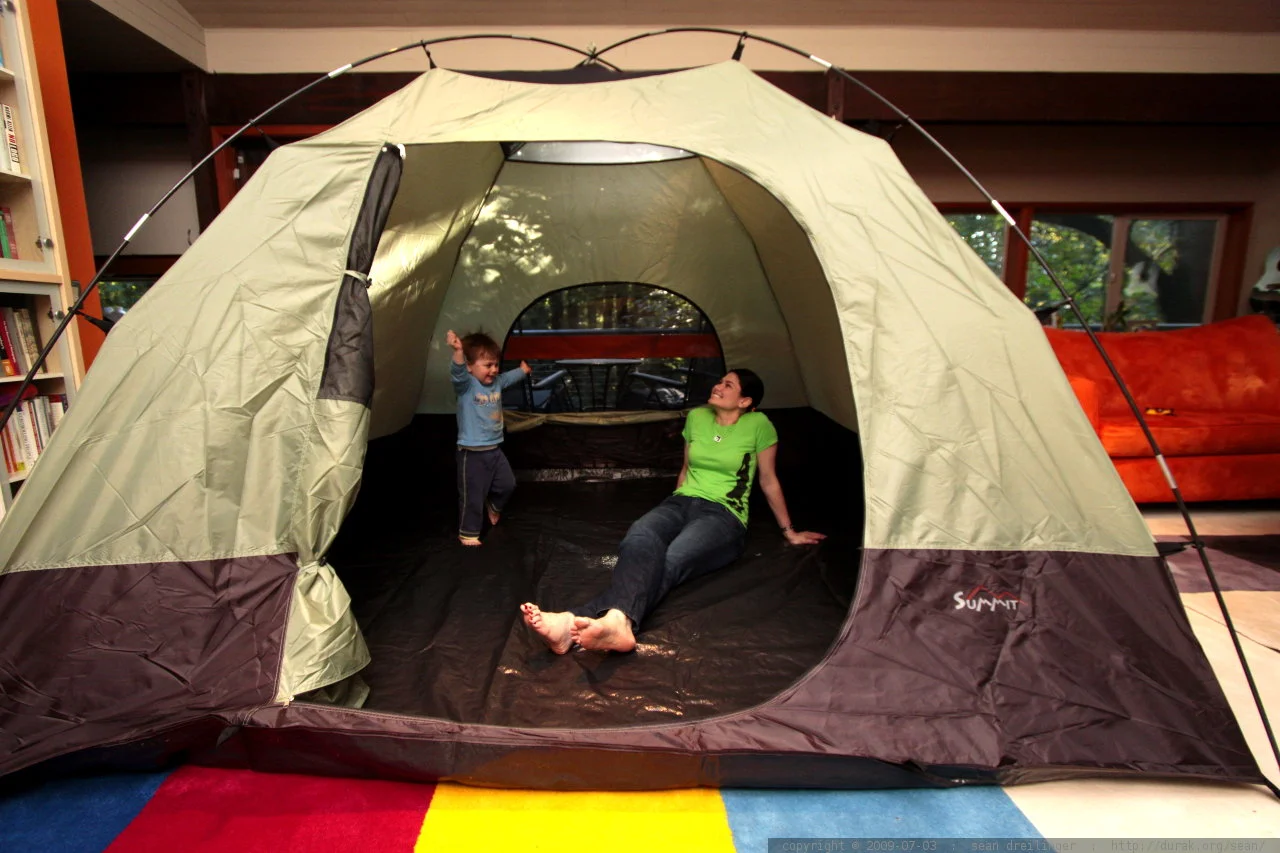 Coleman 8 Person Tent in a camping setting, showcasing its spacious interior and durable construction